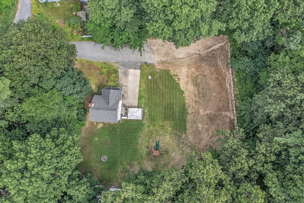 58 Indian Road Groton, MA 01450 - Photo 32 of 35 an aerial view of residential house with outdoor space and trees all around