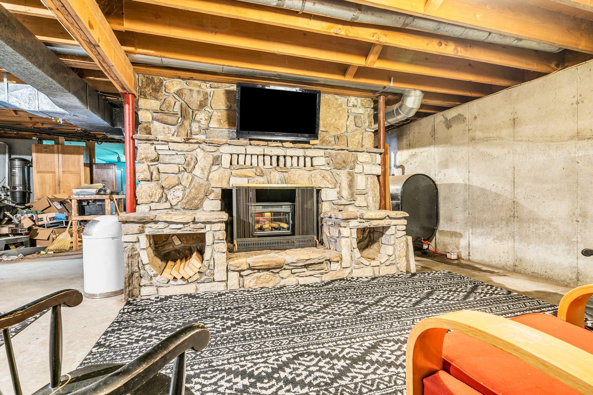897 Lewis Hill Road Bowdoin, ME 04287 - Photo 60 of 79 lower level fireplace