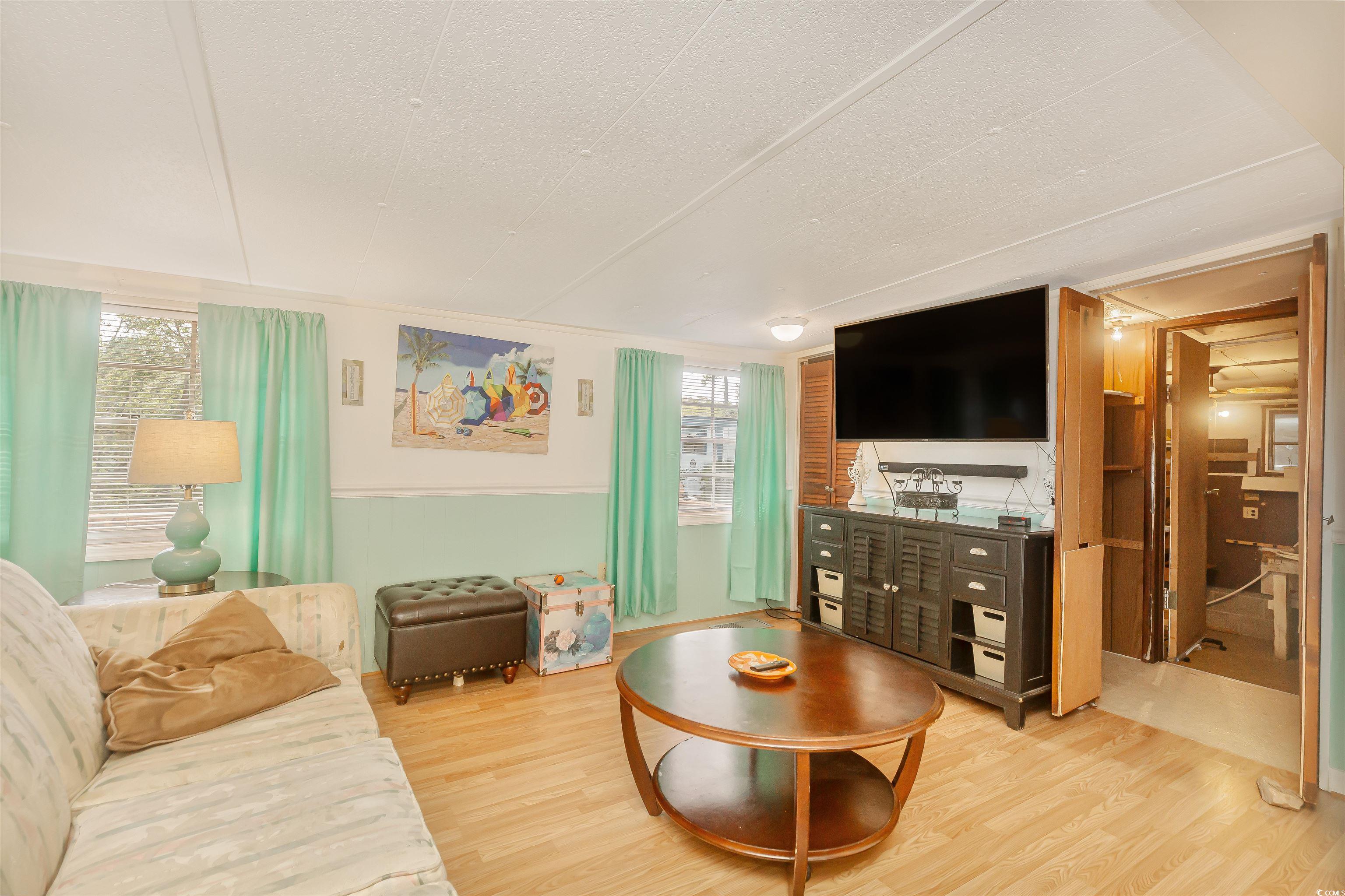 382 West Canal Street Murrells Inlet, SC 29576 - Photo 11 of 38 Living room with hardwood / wood-style floors