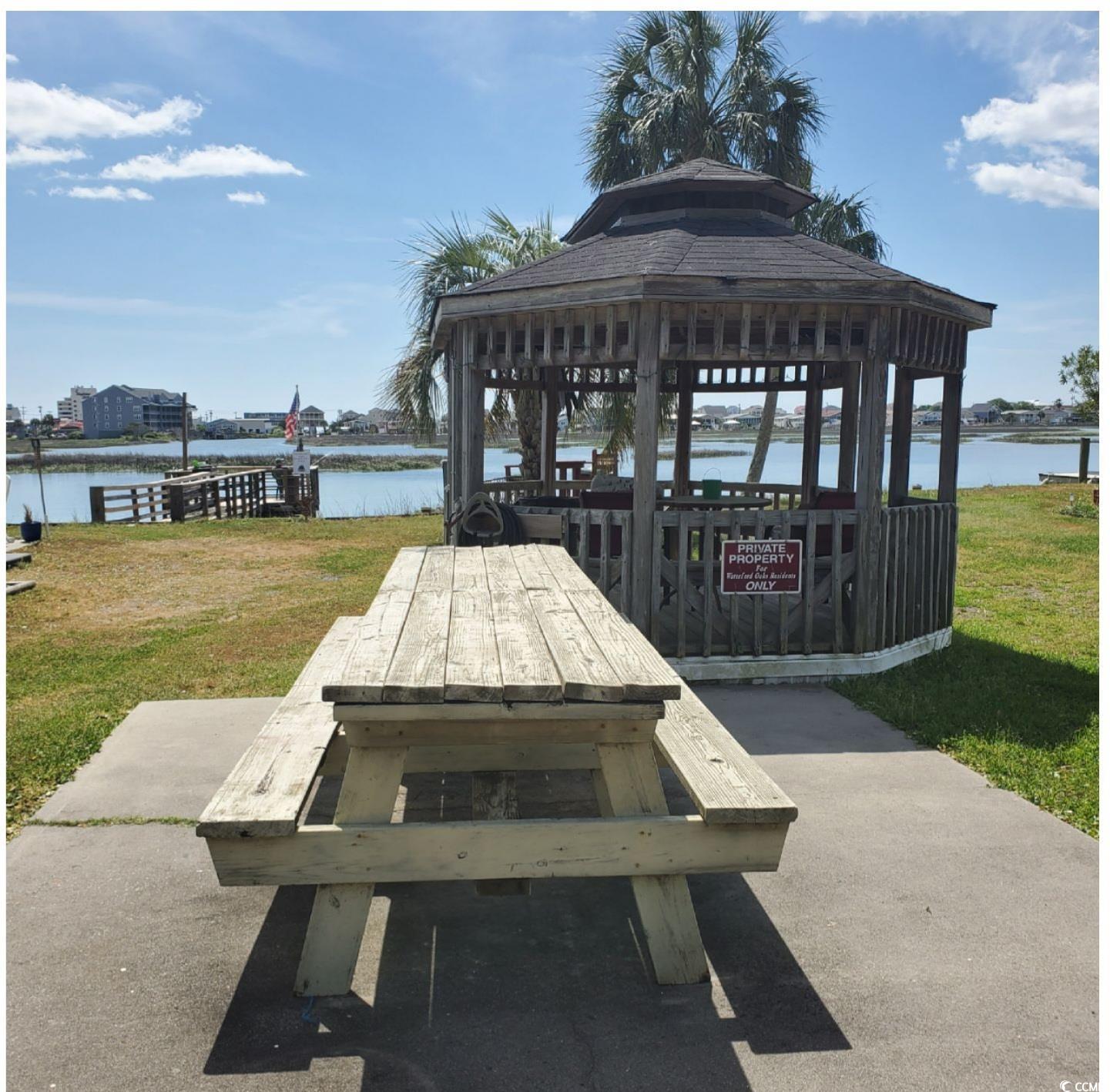 382 West Canal Street Murrells Inlet, SC 29576 - Photo 36 of 38 View of patio with a gazebo and a water view