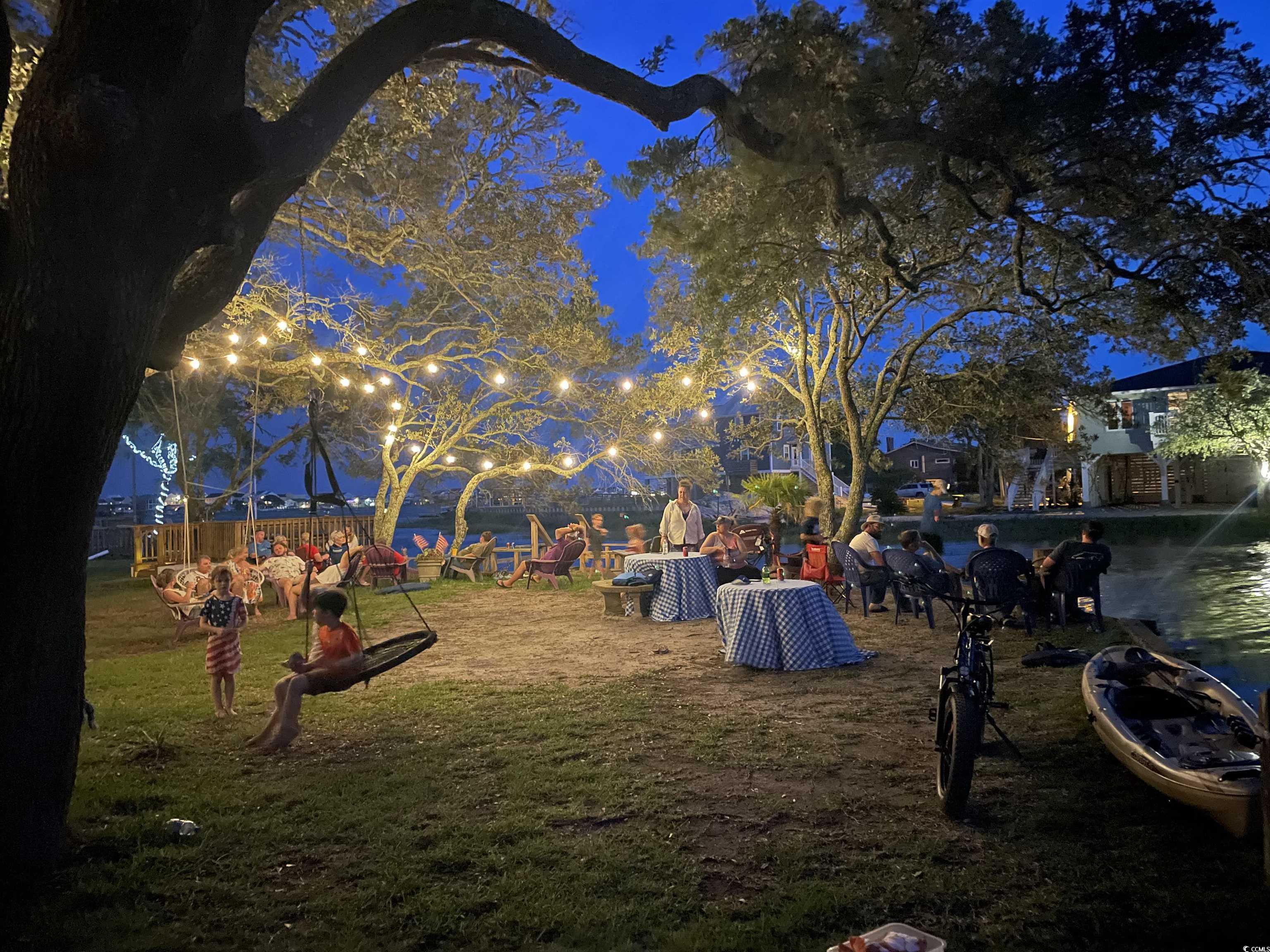 382 West Canal Street Murrells Inlet, SC 29576 - Photo 38 of 38 View of community with a yard