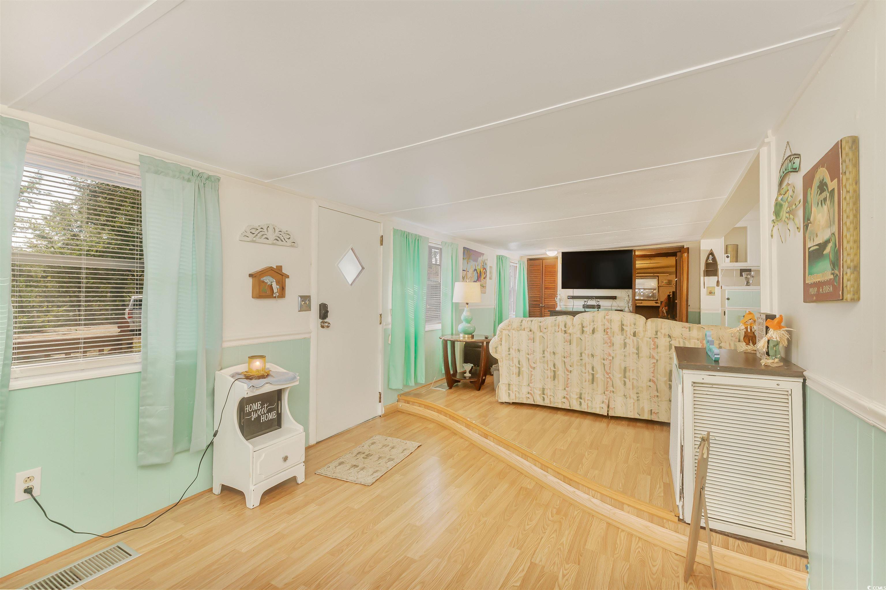 382 West Canal Street Murrells Inlet, SC 29576 - Photo 8 of 38 Living room featuring hardwood / wood-style flooring