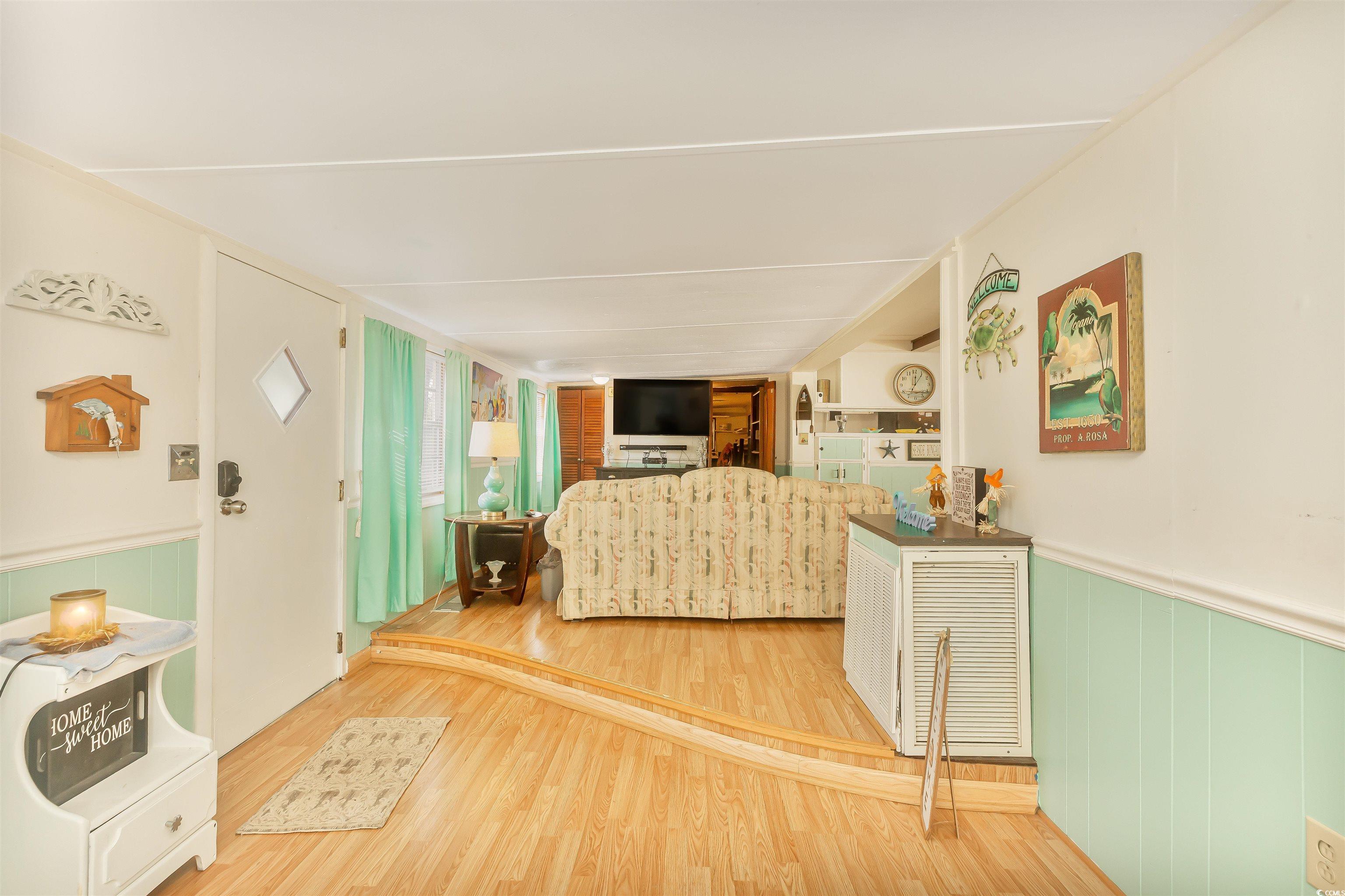 382 West Canal Street Murrells Inlet, SC 29576 - Photo 9 of 38 Living room featuring hardwood / wood-style flooring