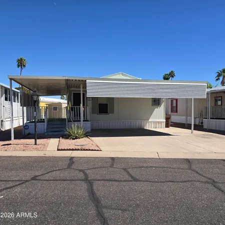 a front view of a house with a garage