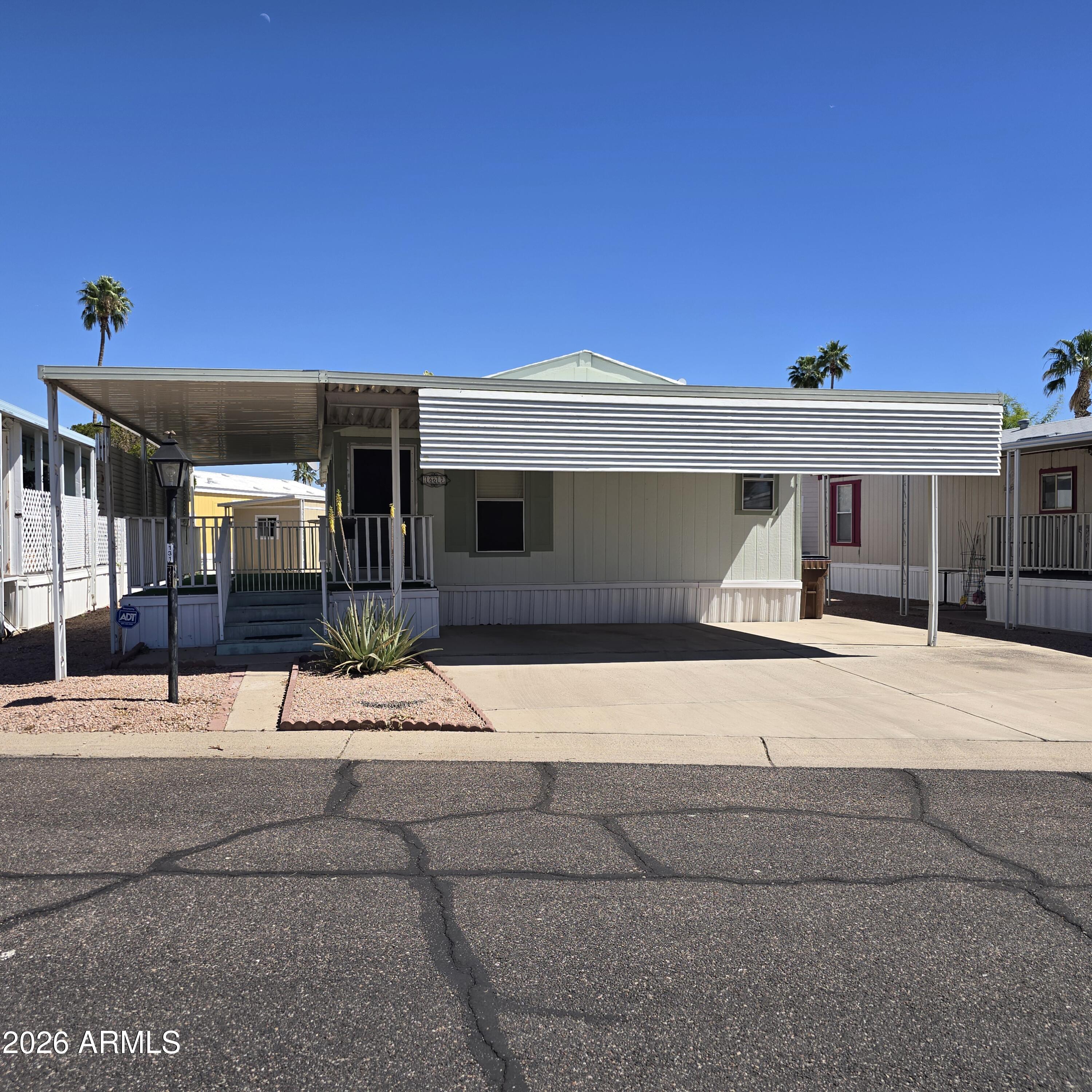 a front view of a house with a garage