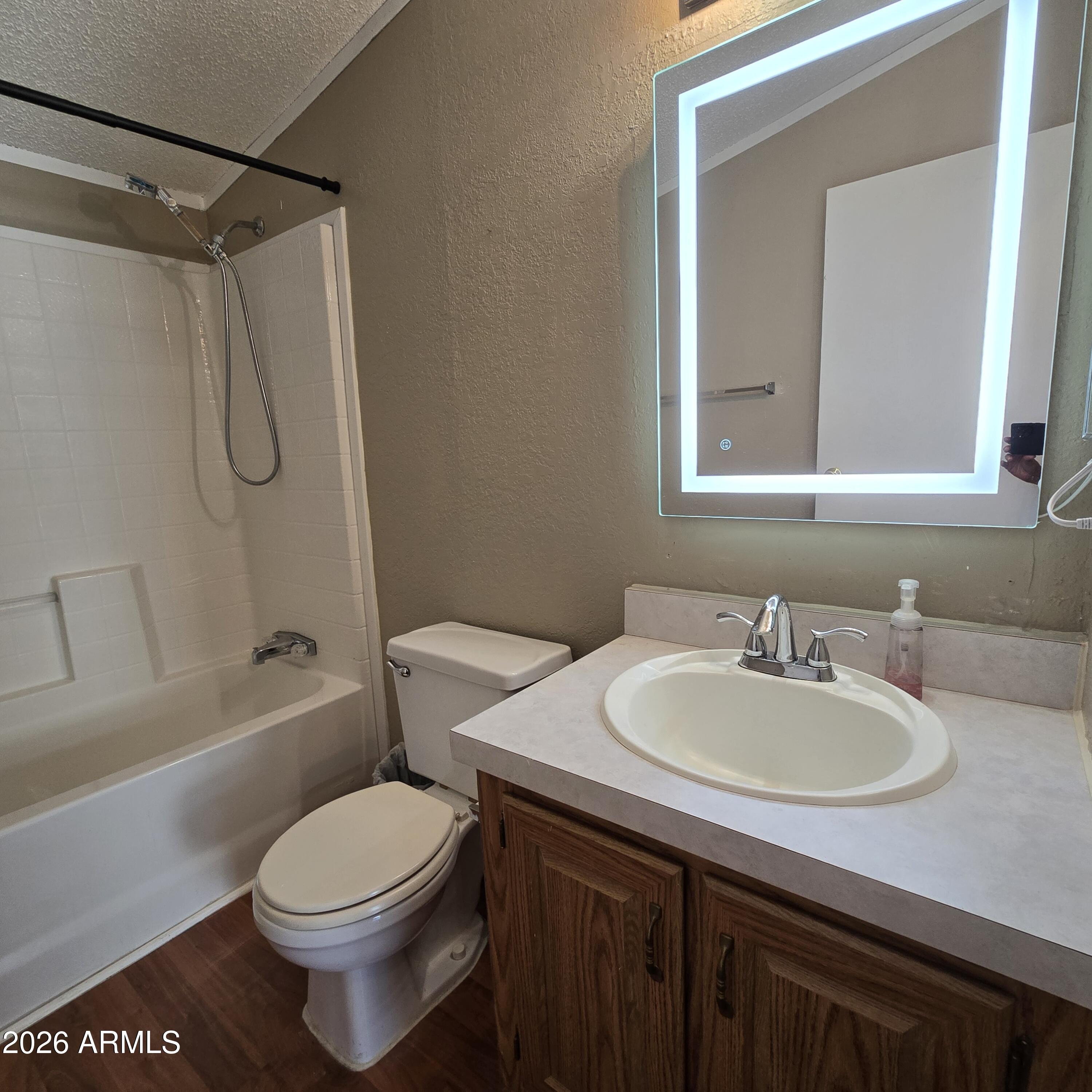 205 West Bell Road, Unit 131 Phoenix, AZ 85023 - Photo 18 of 47 a bathroom with a sink toilet and shower