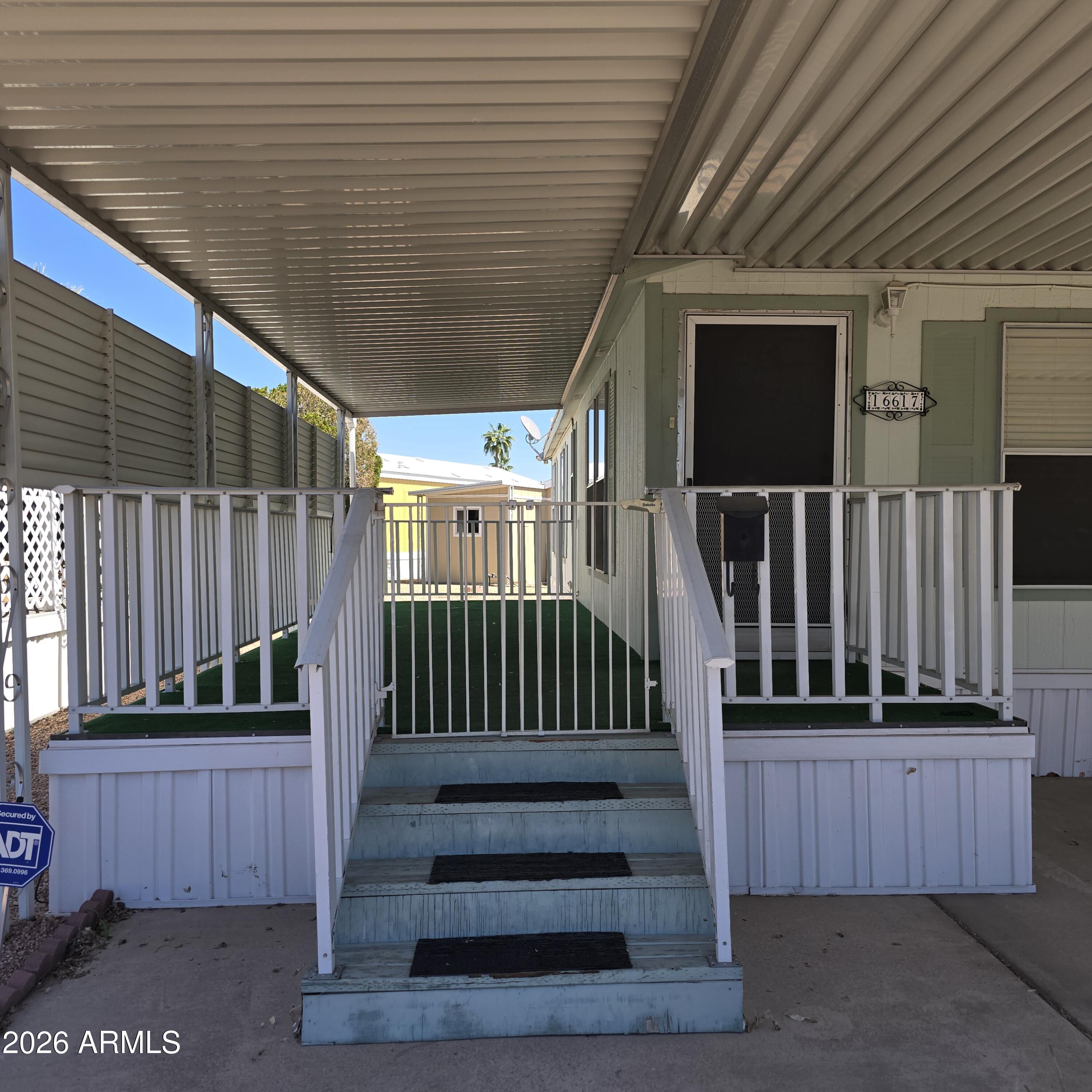 205 West Bell Road, Unit 131 Phoenix, AZ 85023 - Photo 2 of 47 a view of outdoor space with deck and furniture