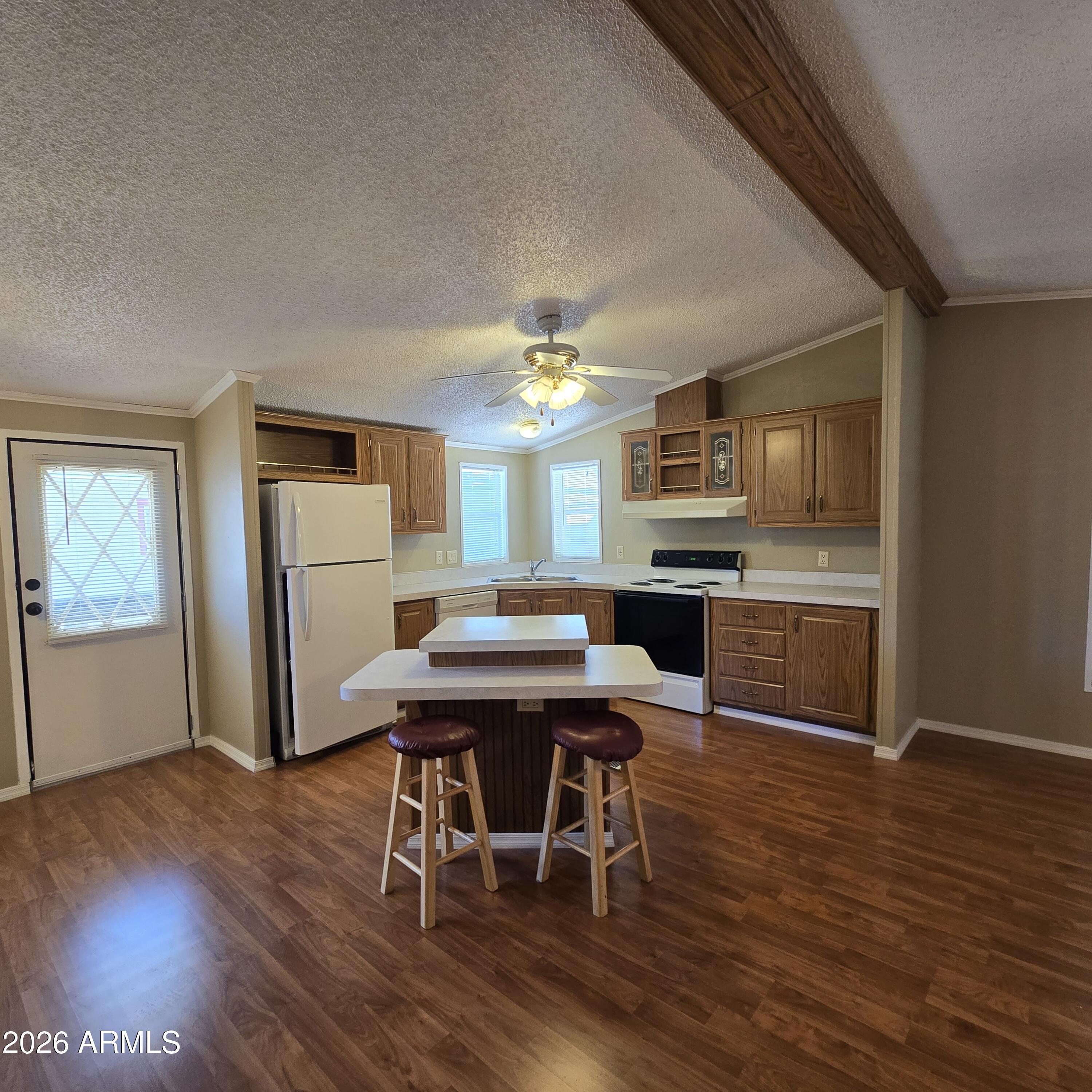 205 West Bell Road, Unit 131 Phoenix, AZ 85023 - Photo 7 of 47 a view of a dining room with furniture window and wooden floor