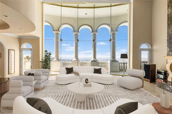 a room with lots of windows and white walls