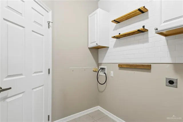 a bathroom with a granite countertop sink and mirror