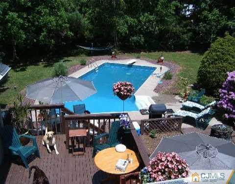 222 Old Post Road Edison, NJ 08817 - Photo 8 of 8 an outdoor space with seating area and trees