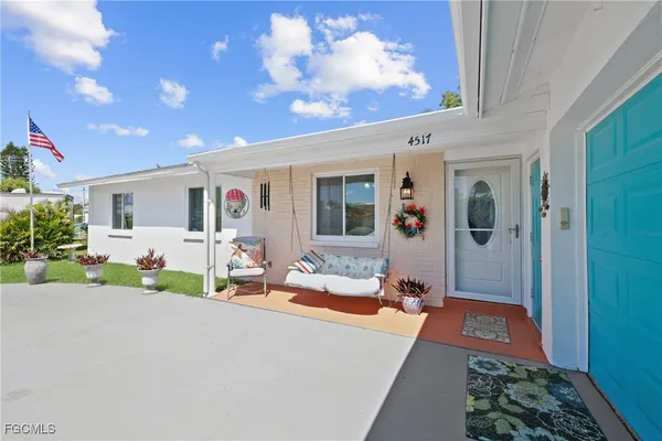 a front view of a house with a patio