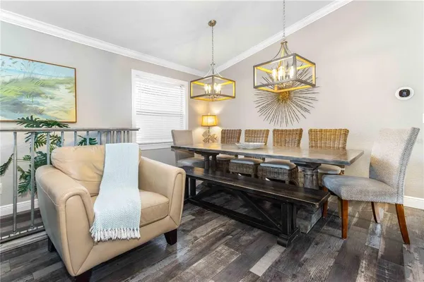 a kitchen with stainless steel appliances granite countertop a sink a stove a microwave and cabinets