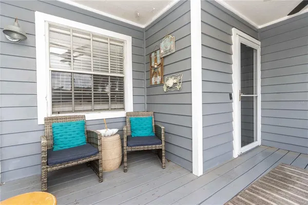 a view of house with a yard