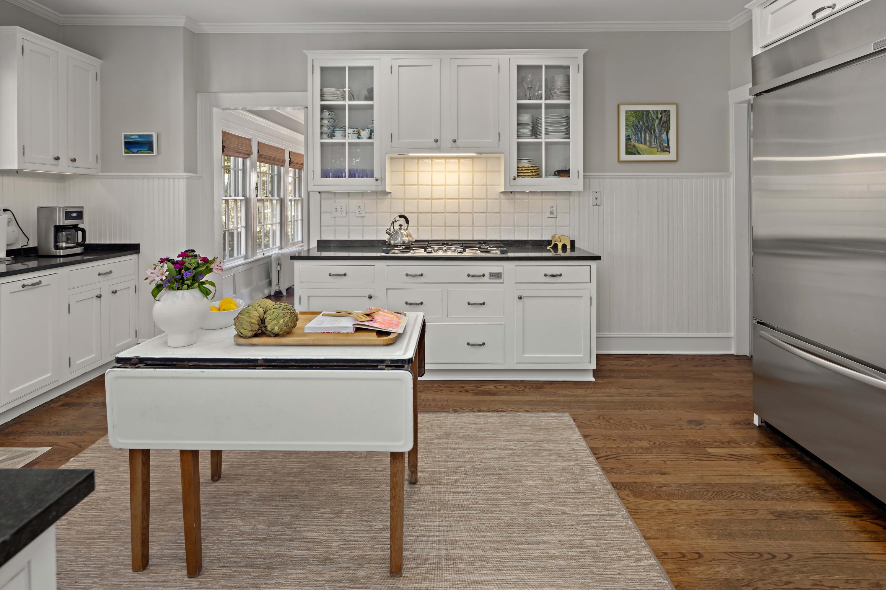 3 Edgehill Drive Darien, CT 06820 - Photo 14 of 40 a white kitchen with a stove and a refrigerator