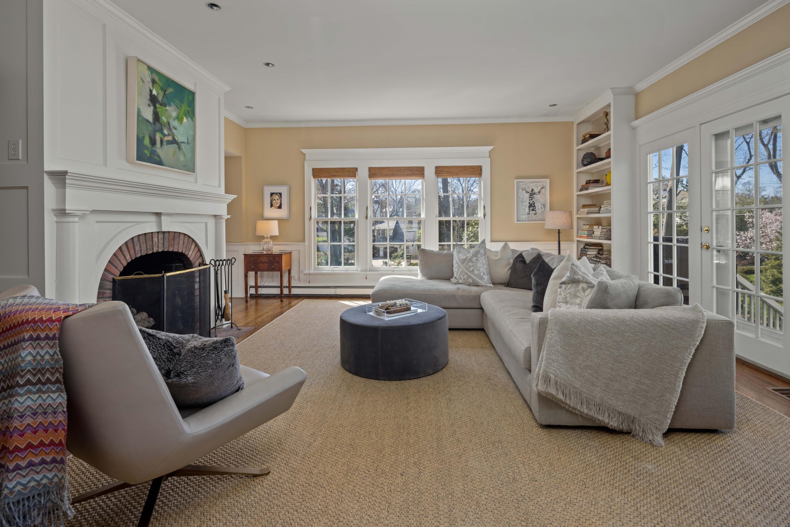 3 Edgehill Drive Darien, CT 06820 - Photo 18 of 40 a living room with furniture and a fireplace