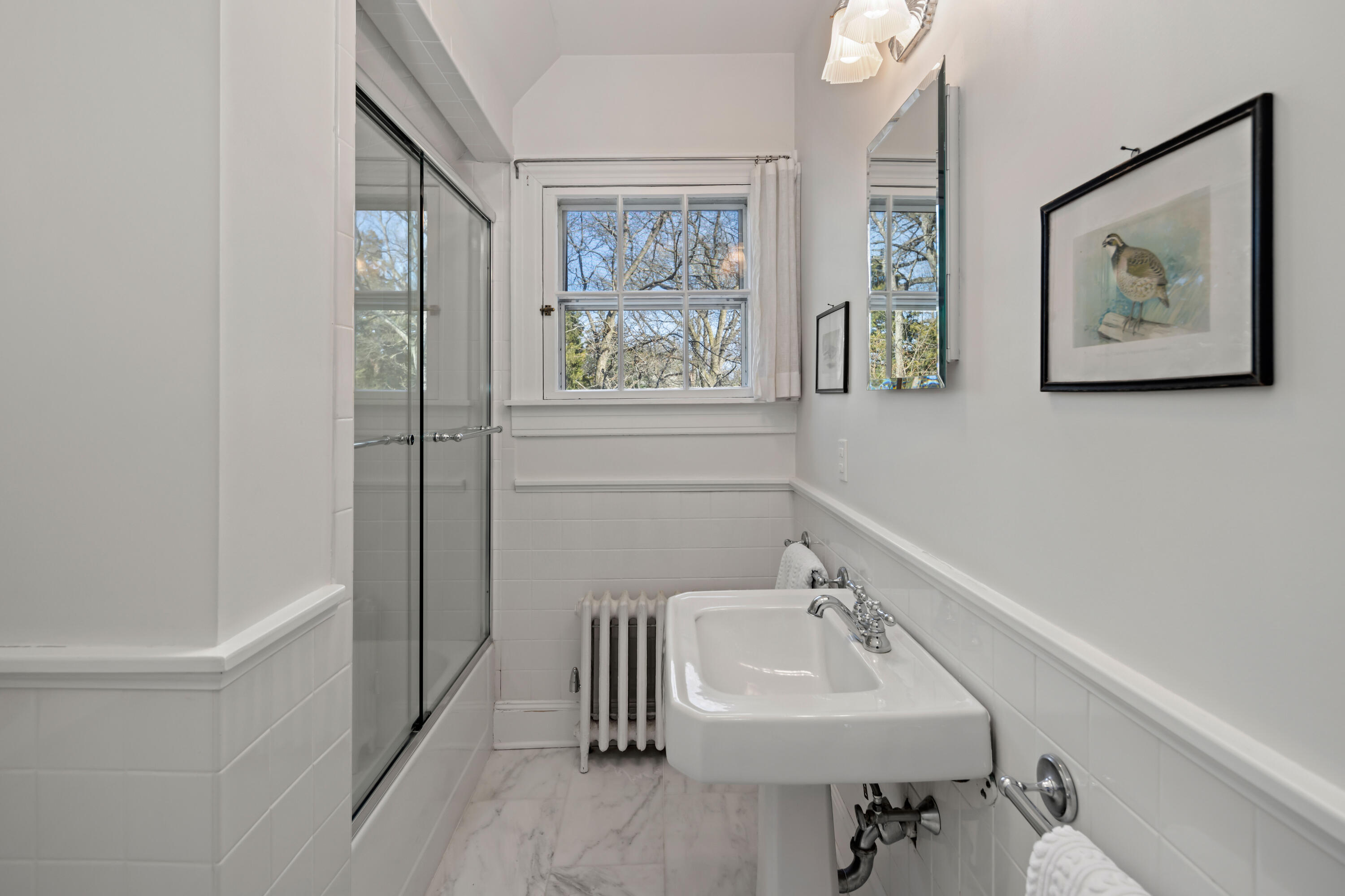 3 Edgehill Drive Darien, CT 06820 - Photo 30 of 40 a bathroom with a sink and a bathtub