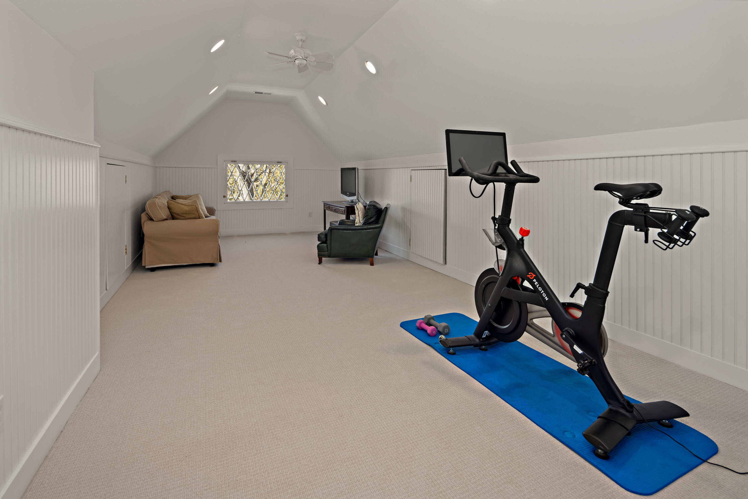 3 Edgehill Drive Darien, CT 06820 - Photo 34 of 40 a room with gym equipment and wooden floor