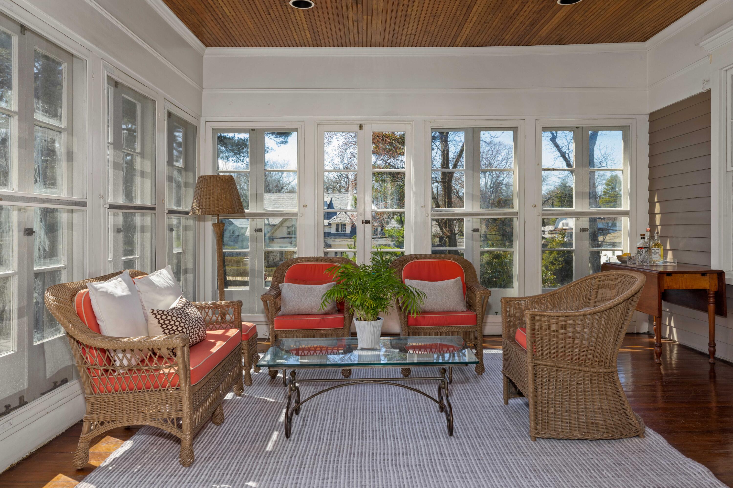 3 Edgehill Drive Darien, CT 06820 - Photo 35 of 40 a living room filled with furniture and a floor to ceiling window