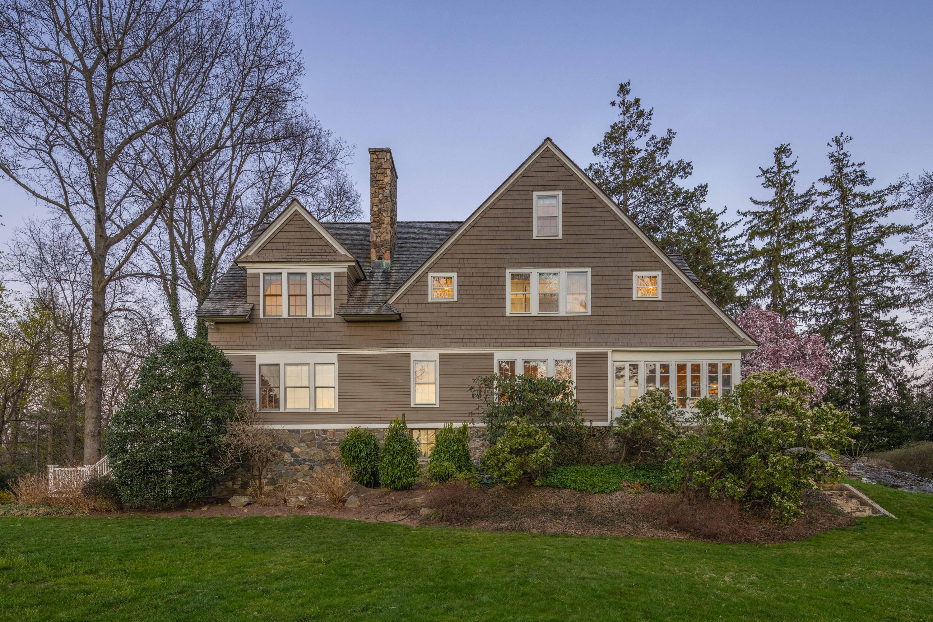 3 Edgehill Drive Darien, CT 06820 - Photo 39 of 40 a front view of a house with a yard and trees