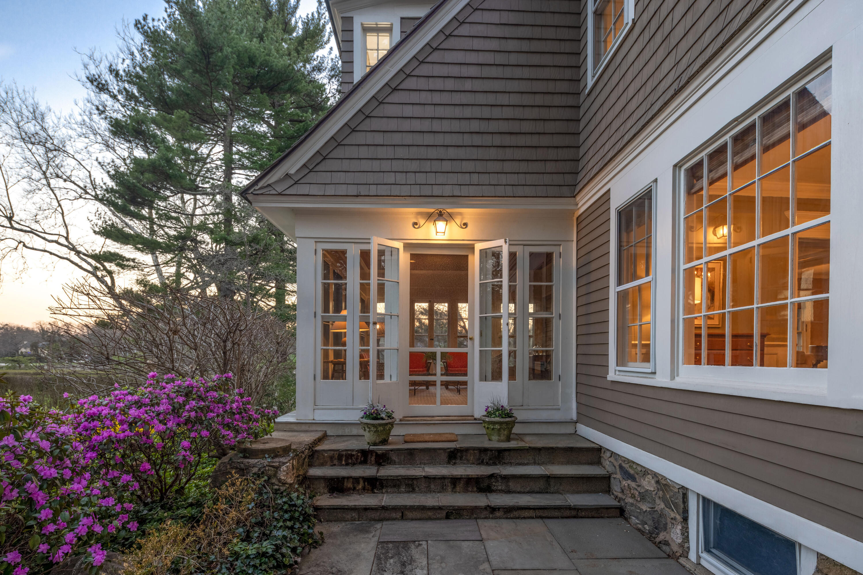 3 Edgehill Drive Darien, CT 06820 - Photo 5 of 40 a front view of a house with a porch