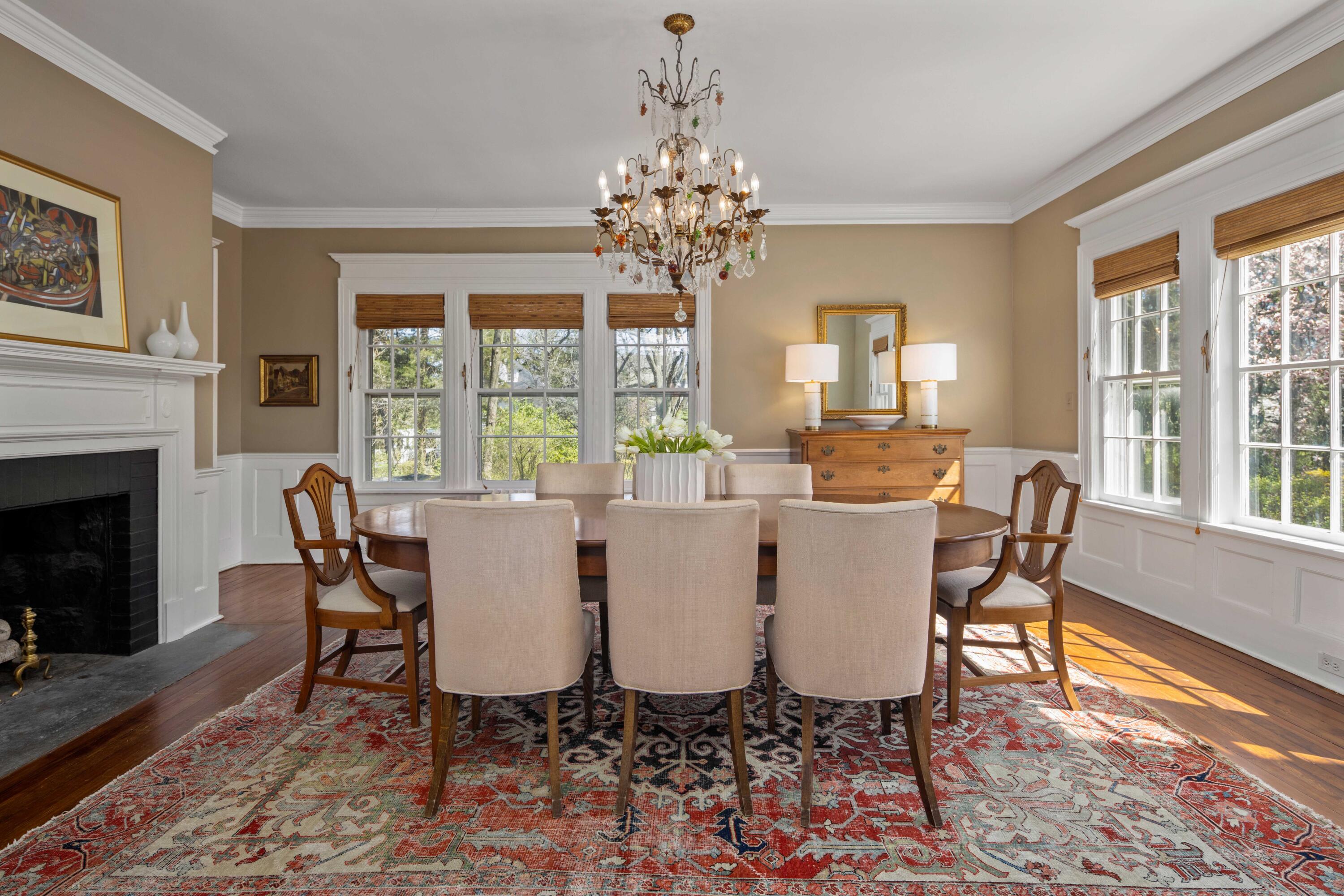 3 Edgehill Drive Darien, CT 06820 - Photo 10 of 40 a view of a dining room with furniture a chandelier and wooden floor