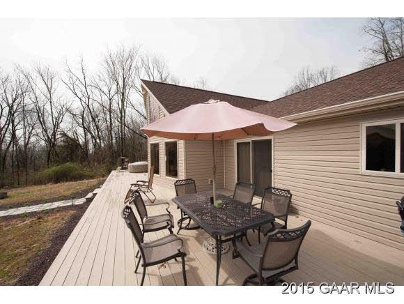 3624 Rockfish Road Grottoes, VA 24441 - Photo 17 of 26 a view of a patio with a table and chairs