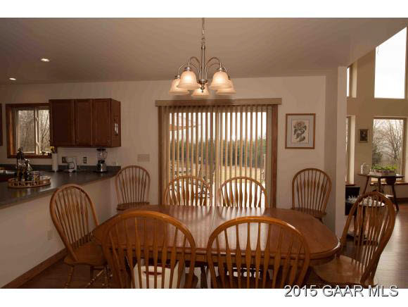 3624 Rockfish Road Grottoes, VA 24441 - Photo 5 of 26 a view of a livingroom with furniture wooden floor a rug and a chandelier