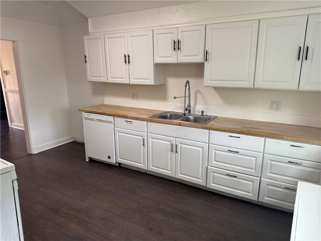 815 Braddock Road Pittsburgh, PA 15221 - Photo 14 of 31 a kitchen with granite countertop white cabinets and sink
