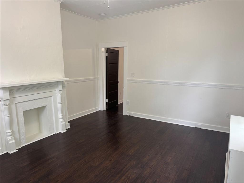 815 Braddock Road Pittsburgh, PA 15221 - Photo 10 of 31 a view of an empty room with wooden floor and a window
