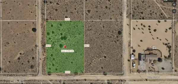 view of a bathroom with a shower and a mirror