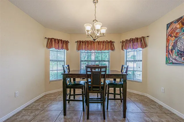 a view of walk in closet with clothes