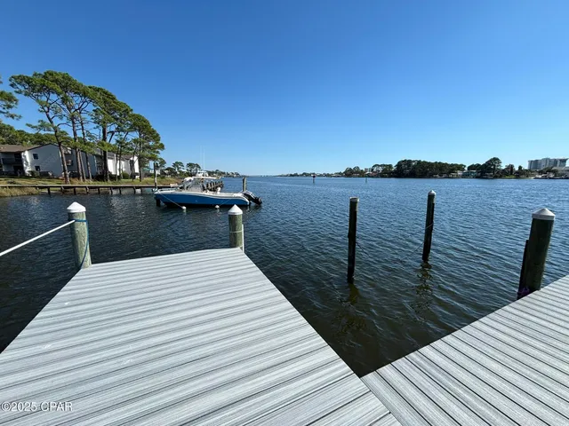 $299,000 | 6903 North Lagoon Drive, Unit 54, Panama City, FL 32408