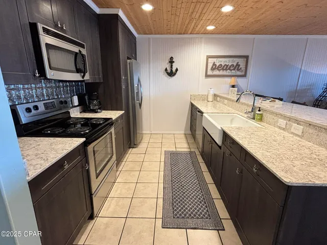 $299,000 | 6903 North Lagoon Drive, Unit 54, Panama City, FL 32408