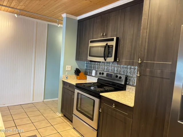 $299,000 | 6903 North Lagoon Drive, Unit 54, Panama City, FL 32408