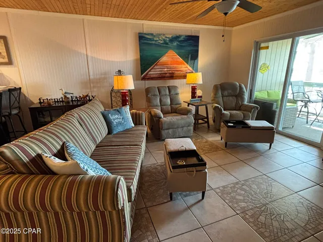$299,000 | 6903 North Lagoon Drive, Unit 54, Panama City, FL 32408