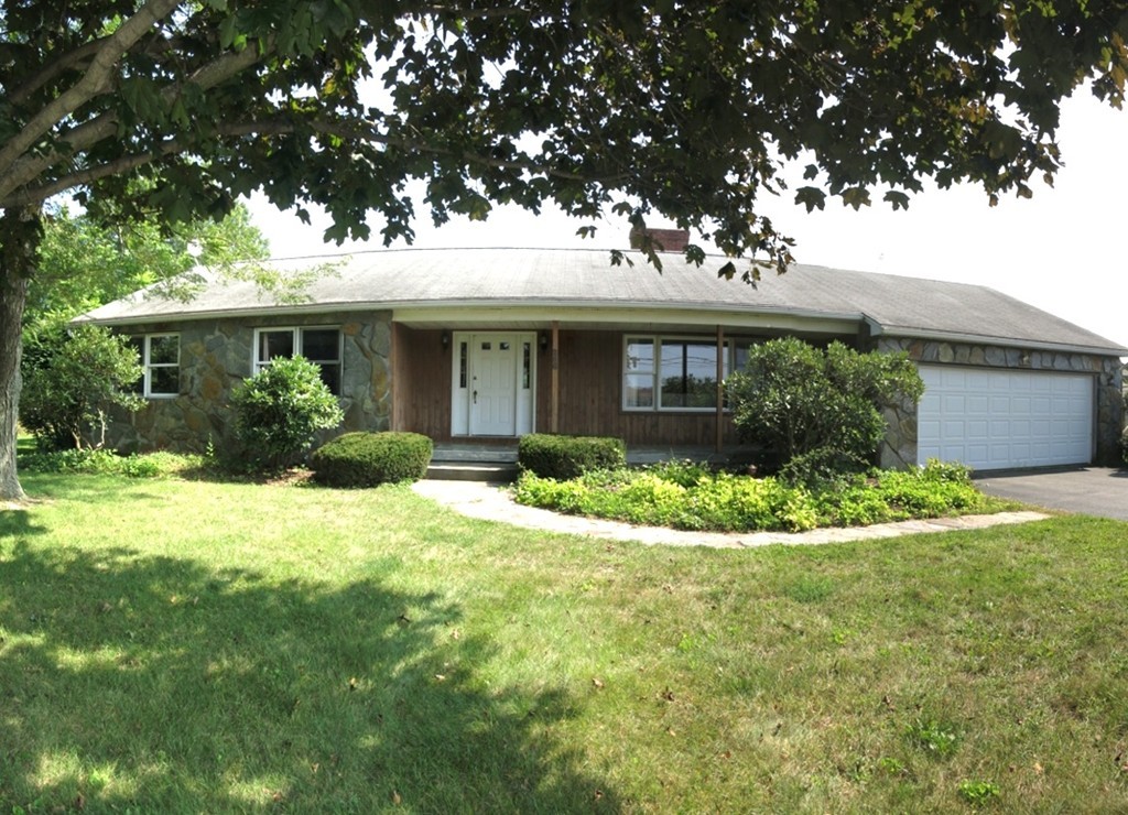 266 Hadley Road Sunderland, MA 01375 - Photo 1 of 23 a front view of a house with a yard and potted plants