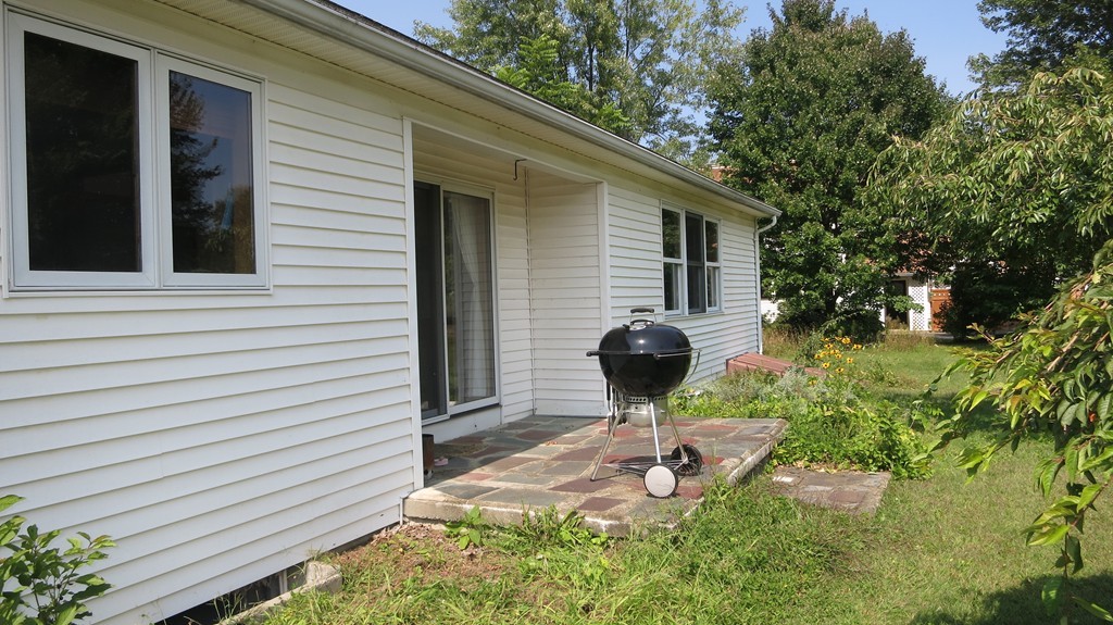 266 Hadley Road Sunderland, MA 01375 - Photo 21 of 23 a backyard of a house with yard fire pit and outdoor seating