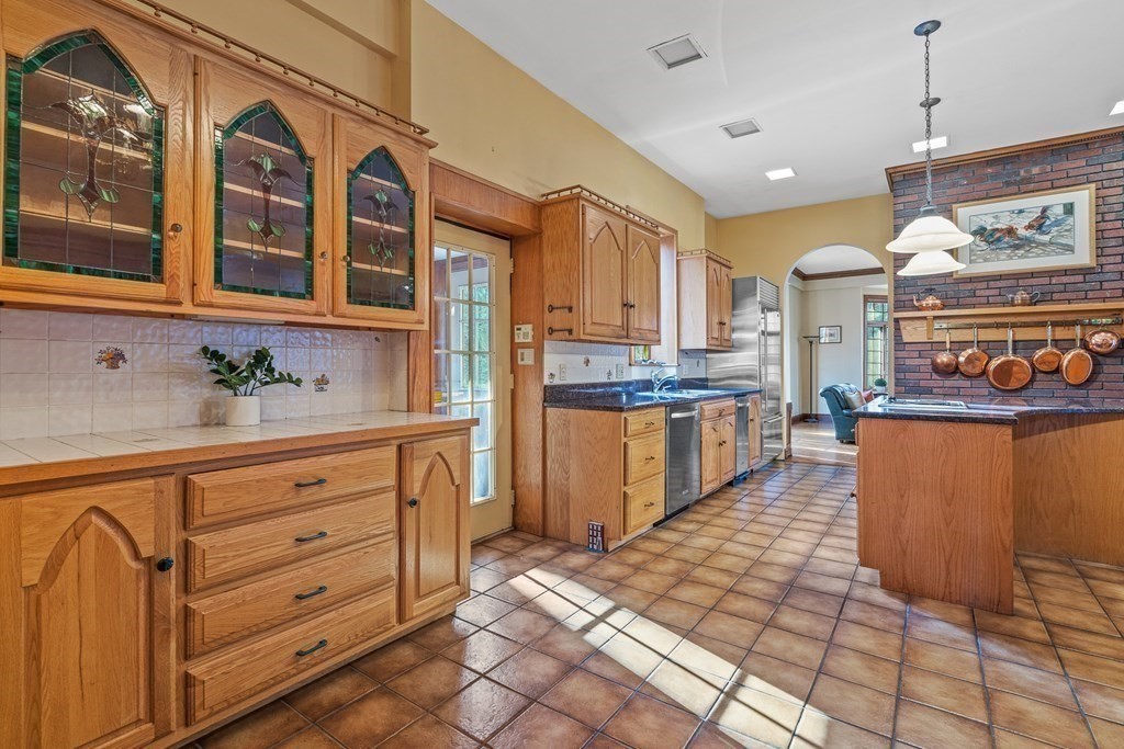 3 Myopia Road Winchester, MA 01890 - Photo 14 of 39 a kitchen with stainless steel appliances granite countertop a stove a sink and a refrigerator