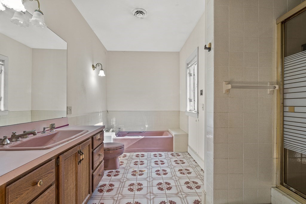 3 Myopia Road Winchester, MA 01890 - Photo 26 of 39 a bathroom with a sink a toilet a shower and a mirror