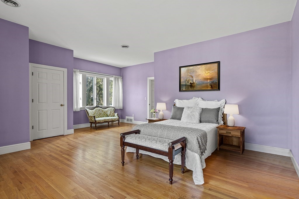 3 Myopia Road Winchester, MA 01890 - Photo 27 of 39 a spacious bedroom with a bed and a couch