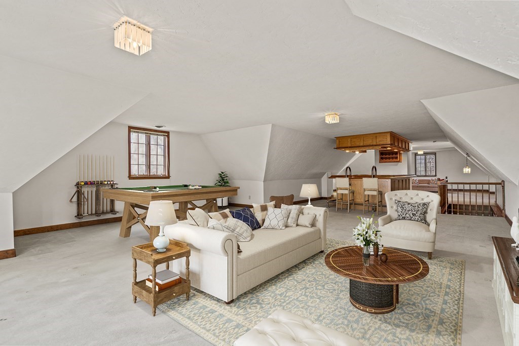 3 Myopia Road Winchester, MA 01890 - Photo 29 of 39 a living room with furniture and a wooden floor