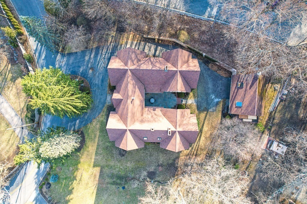 3 Myopia Road Winchester, MA 01890 - Photo 37 of 39 a backyard of a house with outdoor seating