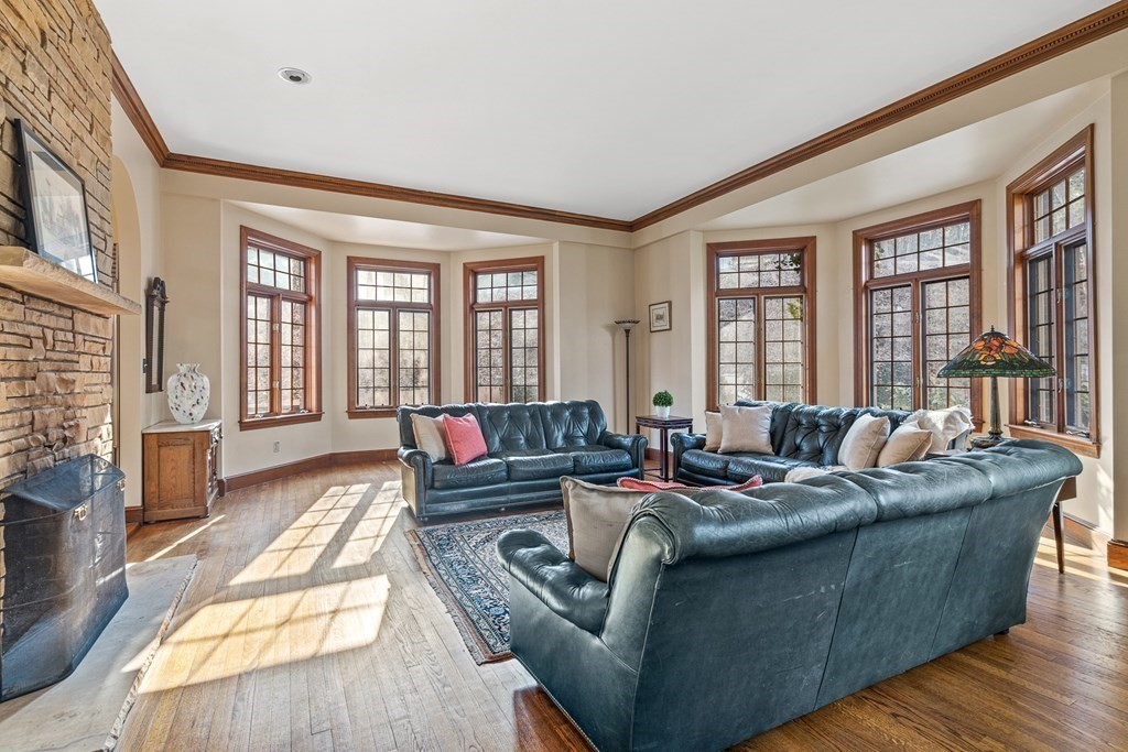 3 Myopia Road Winchester, MA 01890 - Photo 9 of 39 a living room with furniture and a large window