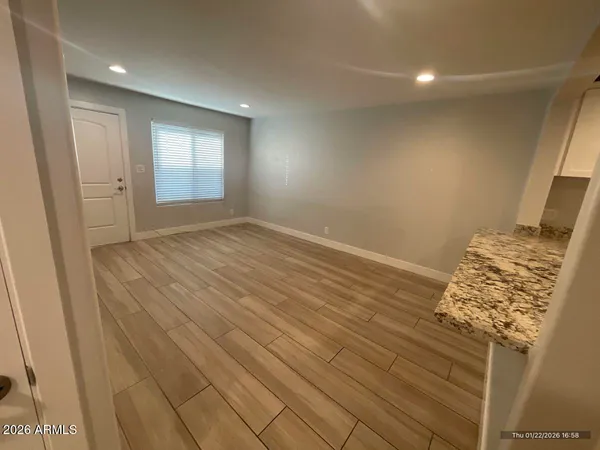 an empty room with windows