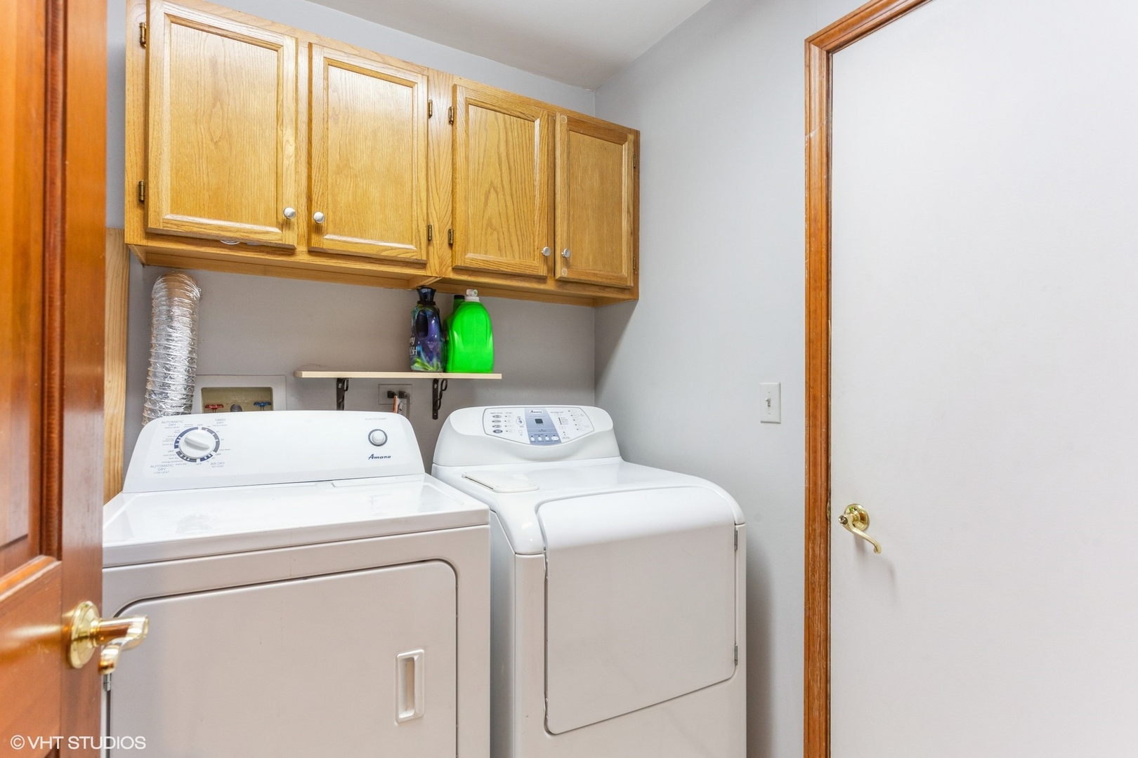 910 Prospect Court, Unit 910 Naperville, IL 60540 - Photo 14 of 17 a utility room with dryer and washer