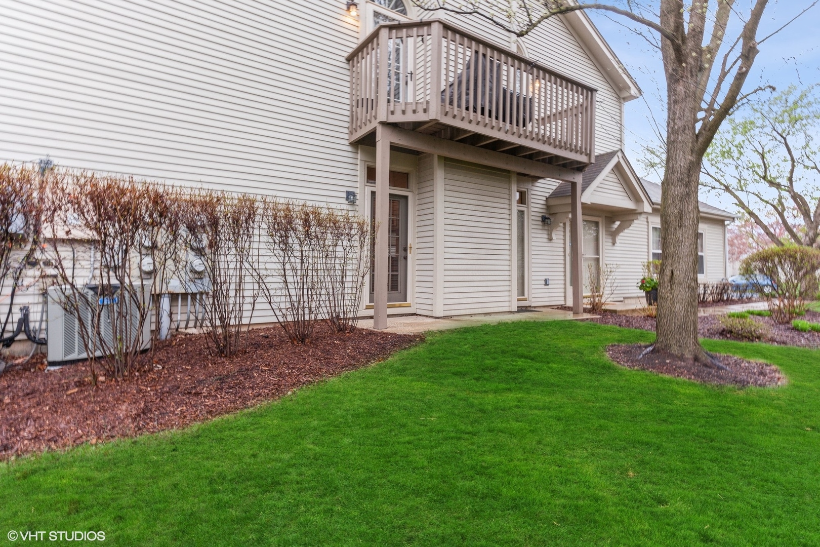 910 Prospect Court, Unit 910 Naperville, IL 60540 - Photo 17 of 17 a front view of a house with garden