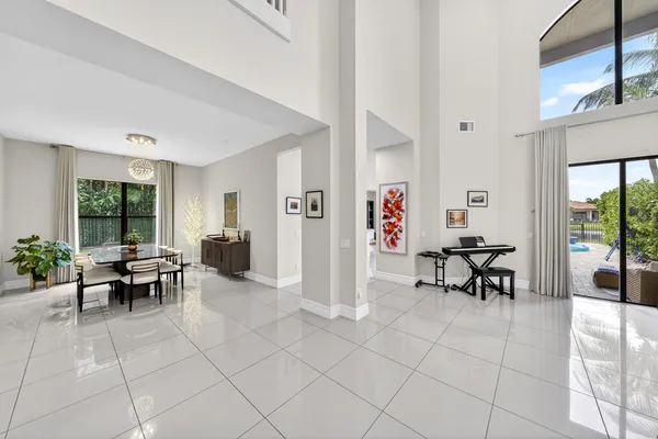 a living room with furniture and flat screen tv