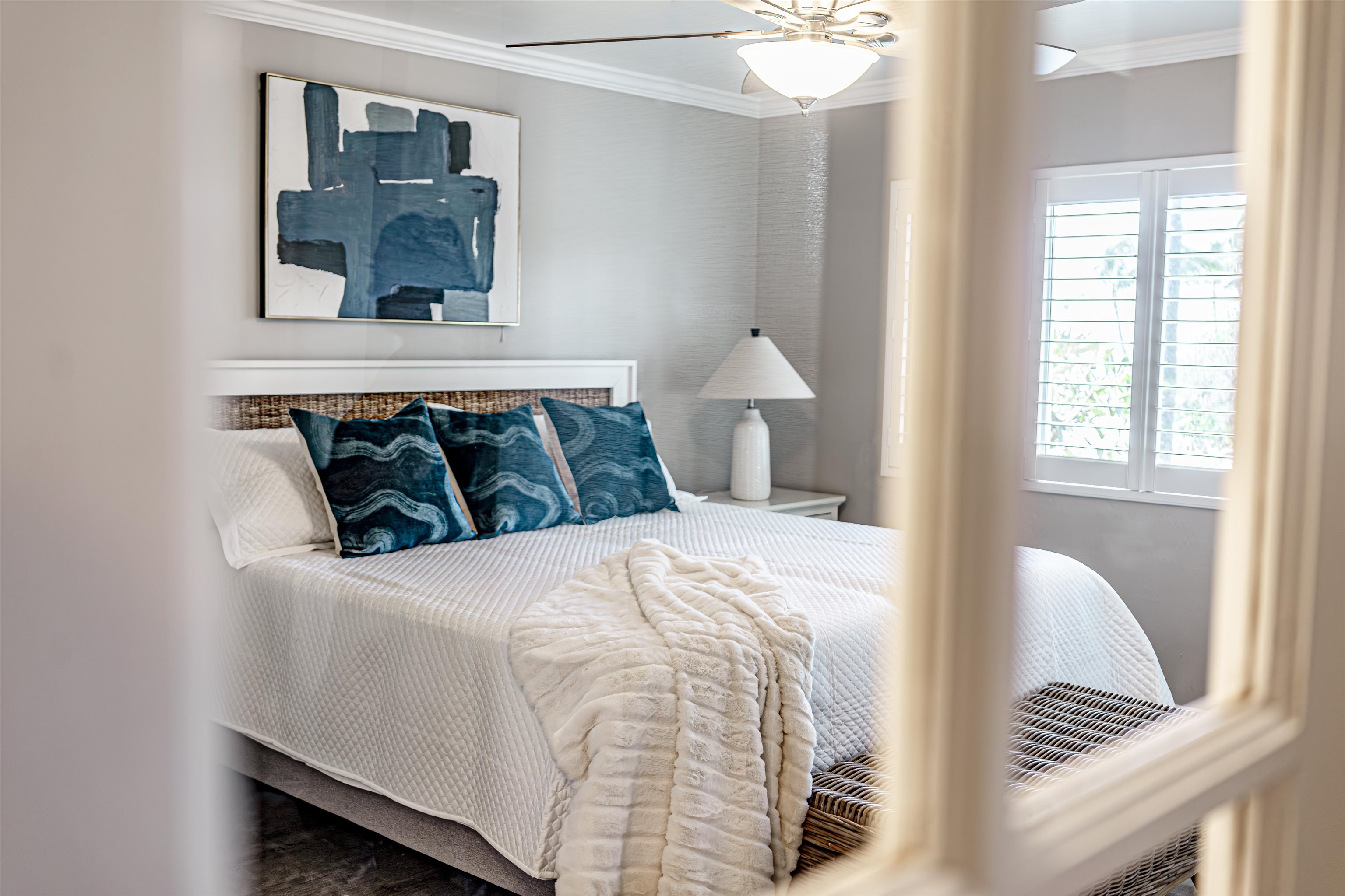 760 South Kihei Road, Unit 202 Kihei, HI 96753 - Photo 12 of 31 a bedroom with a bed and a window