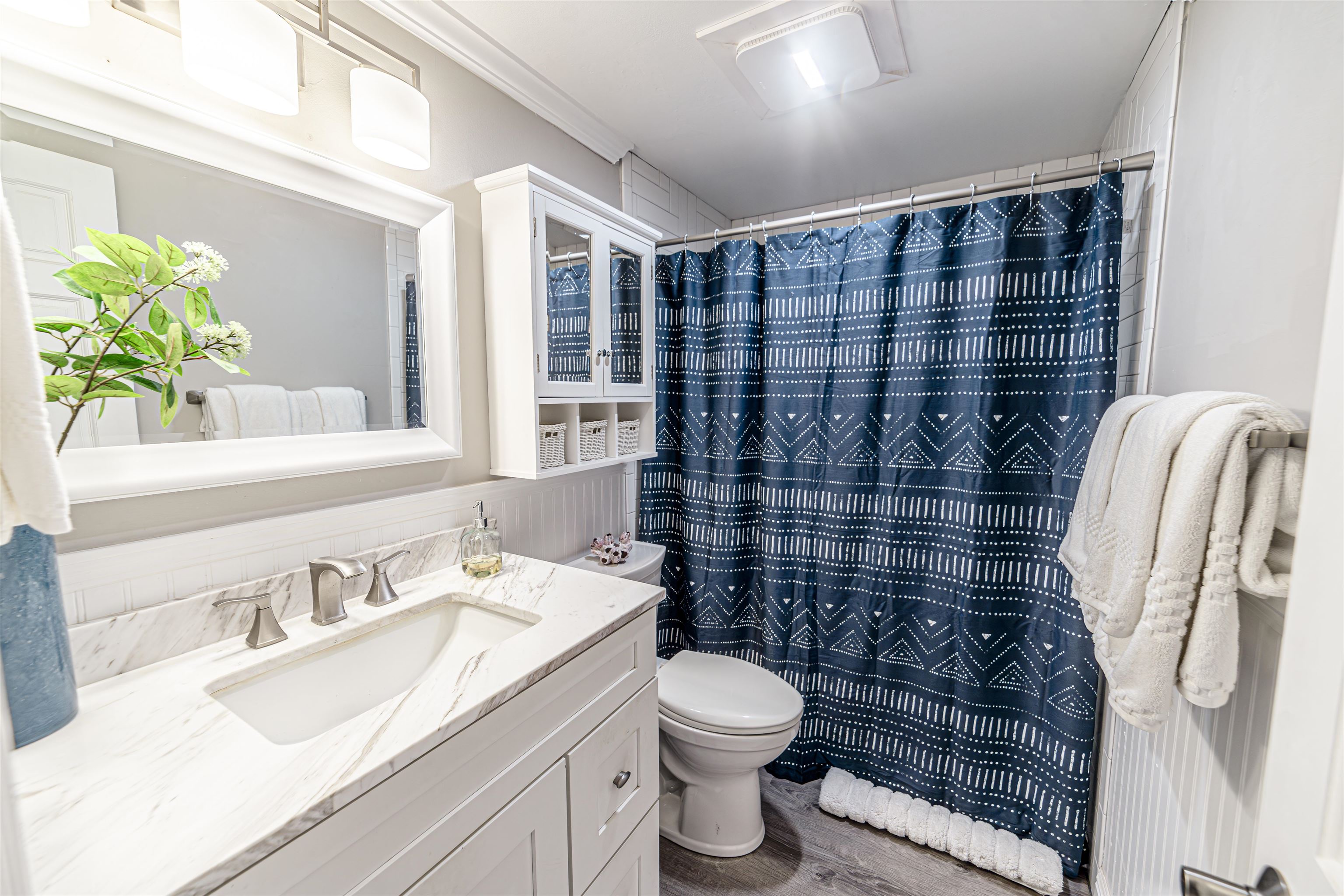 760 South Kihei Road, Unit 202 Kihei, HI 96753 - Photo 16 of 31 a bathroom with a sink toilet and shower